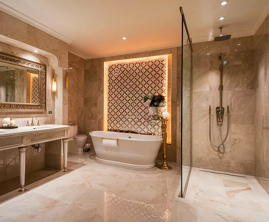 Marble bathroom with mosaic accent